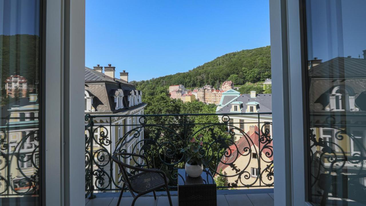 Luxury Spa Hotel Olympic Palace Karlovy Vary Exterior photo View of the town from the balcony of a guest house