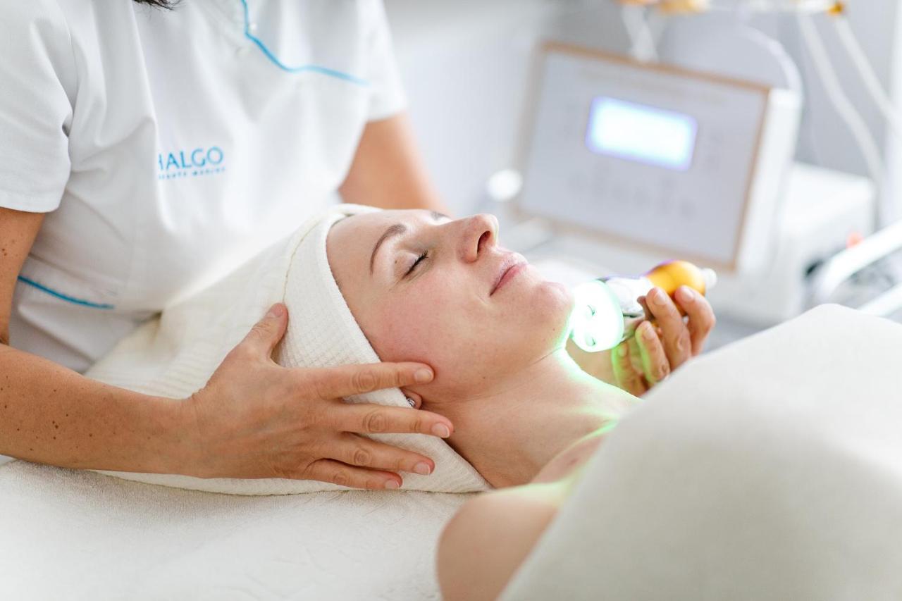Luxury Spa Hotel Olympic Palace Karlovy Vary Exterior photo A woman receiving a facial treatment