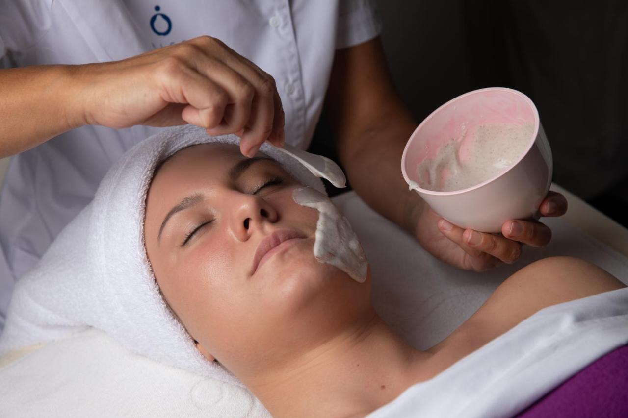 Luxury Spa Hotel Olympic Palace Karlovy Vary Exterior photo A woman receiving a facial treatment